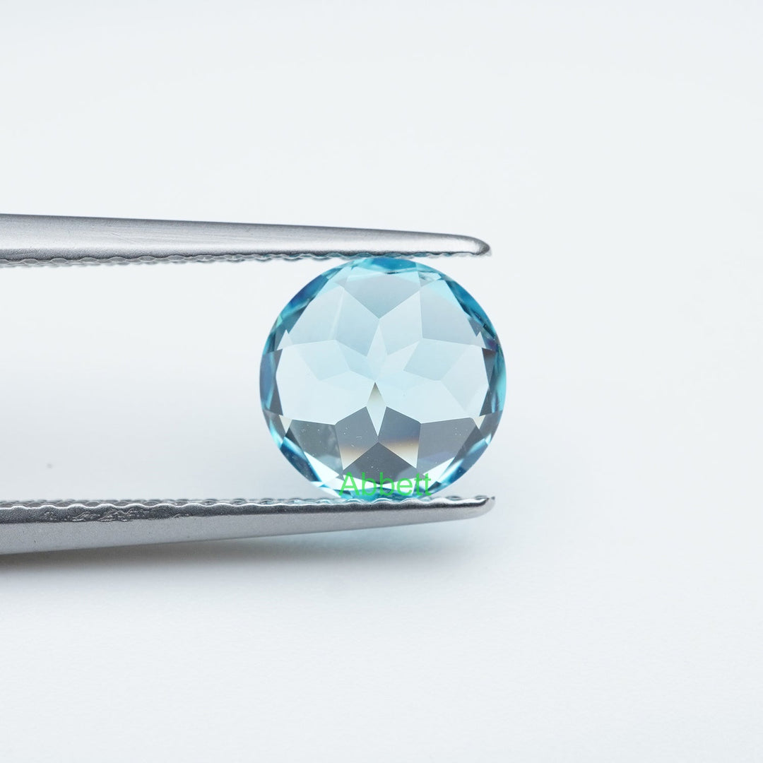 Round lab grown santa maria sapphire