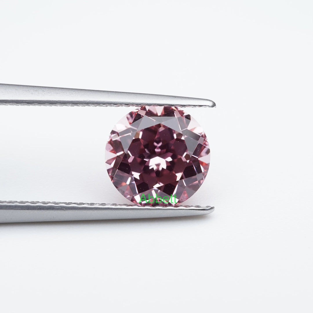 Round lab grown champagne sapphire