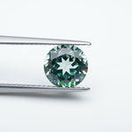 Load image into Gallery viewer, Round lab grown green sapphire
