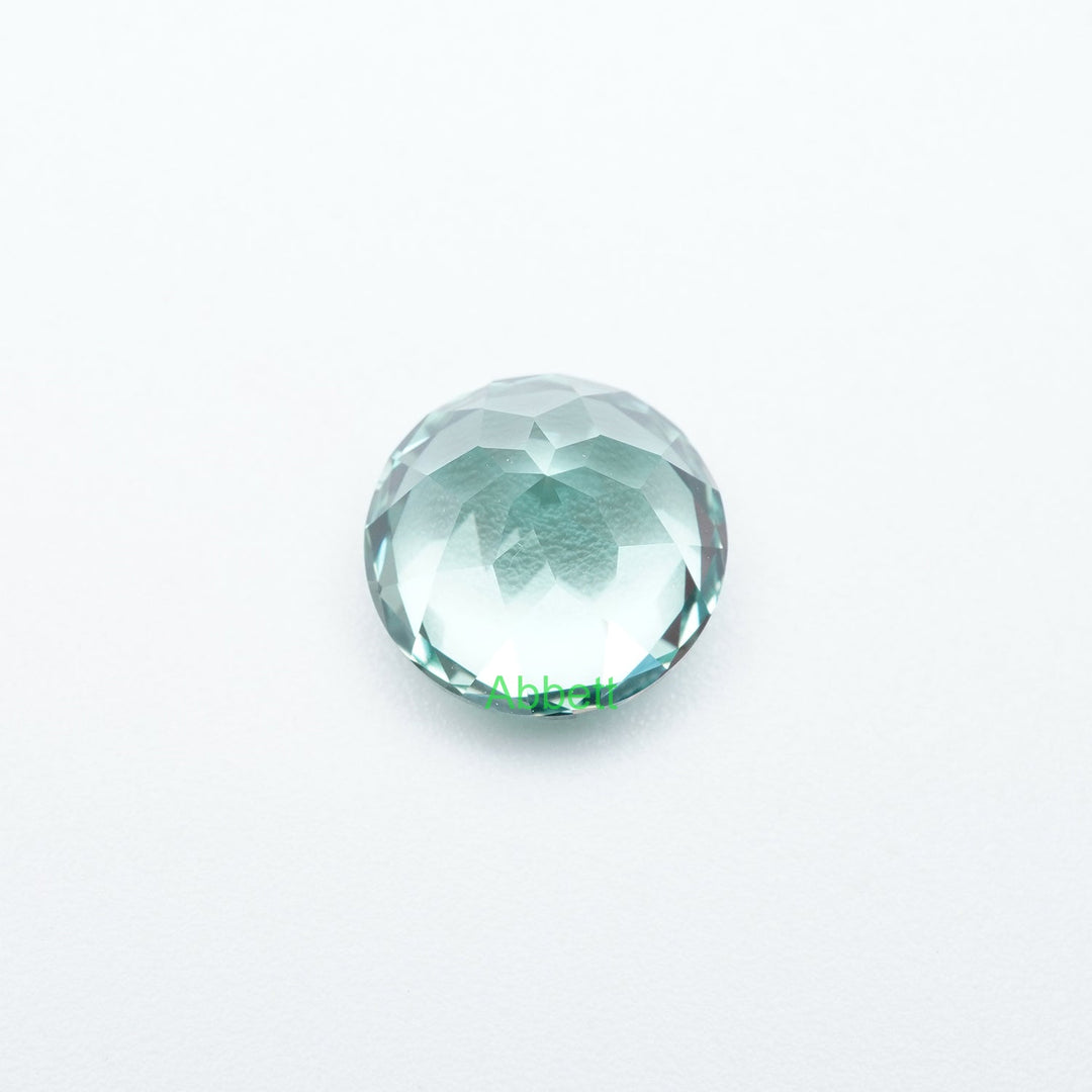 Round lab grown green sapphire