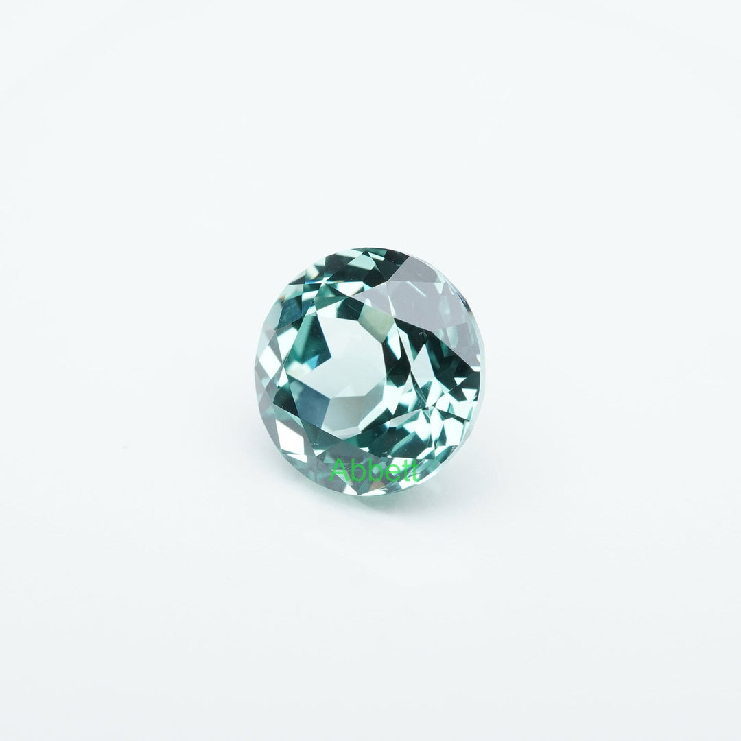 Round lab grown green sapphire