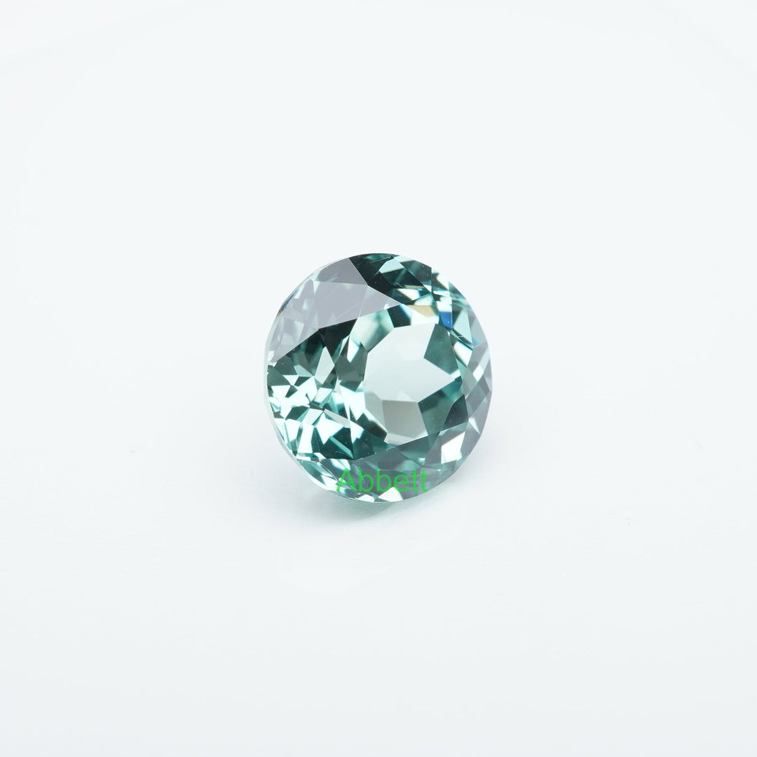 Round lab grown green sapphire