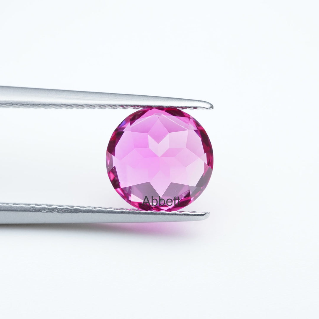 Round lab grown hot pink sapphire