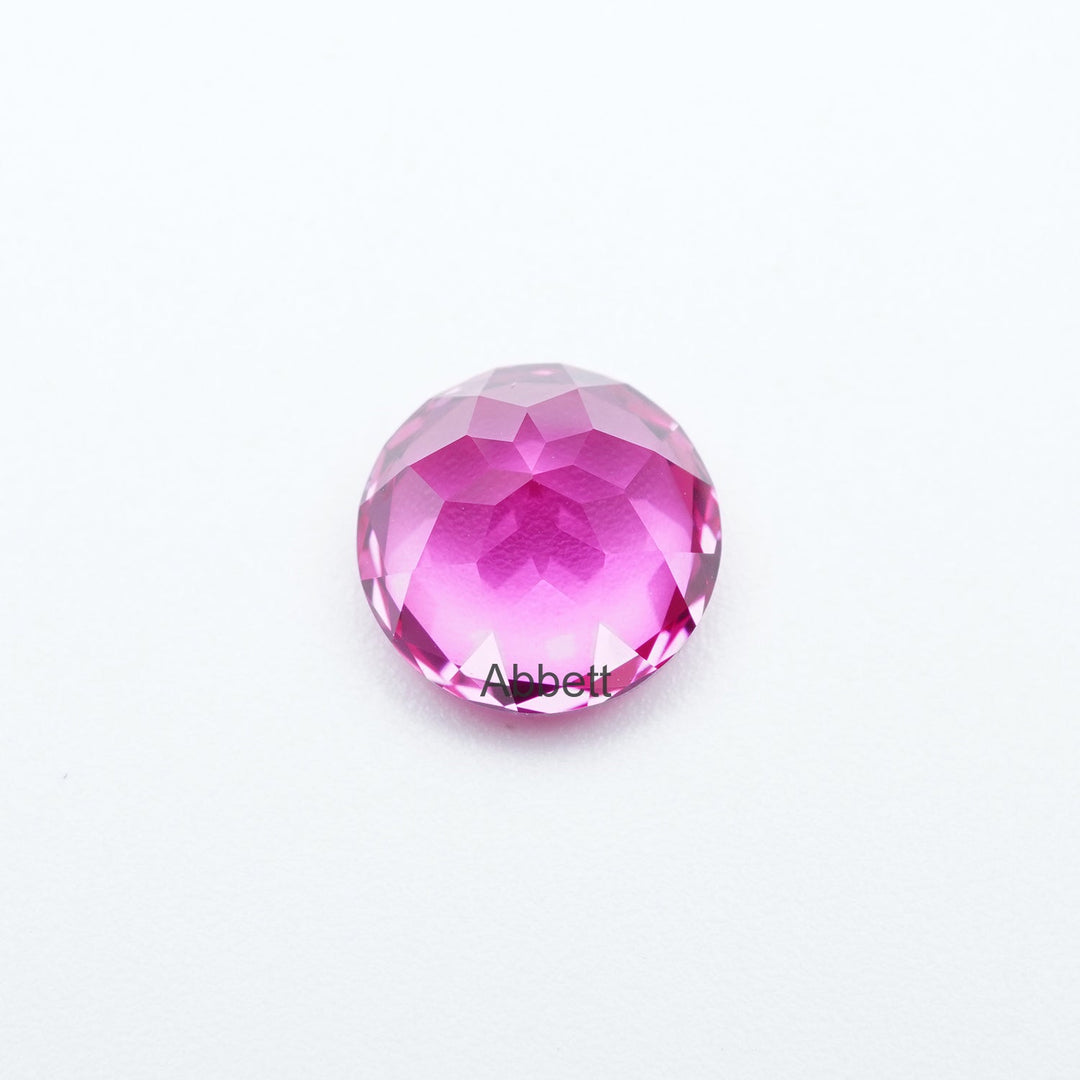 Round lab grown hot pink sapphire
