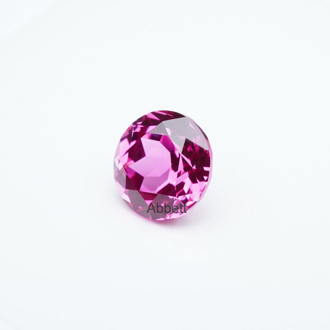 Round lab grown hot pink sapphire