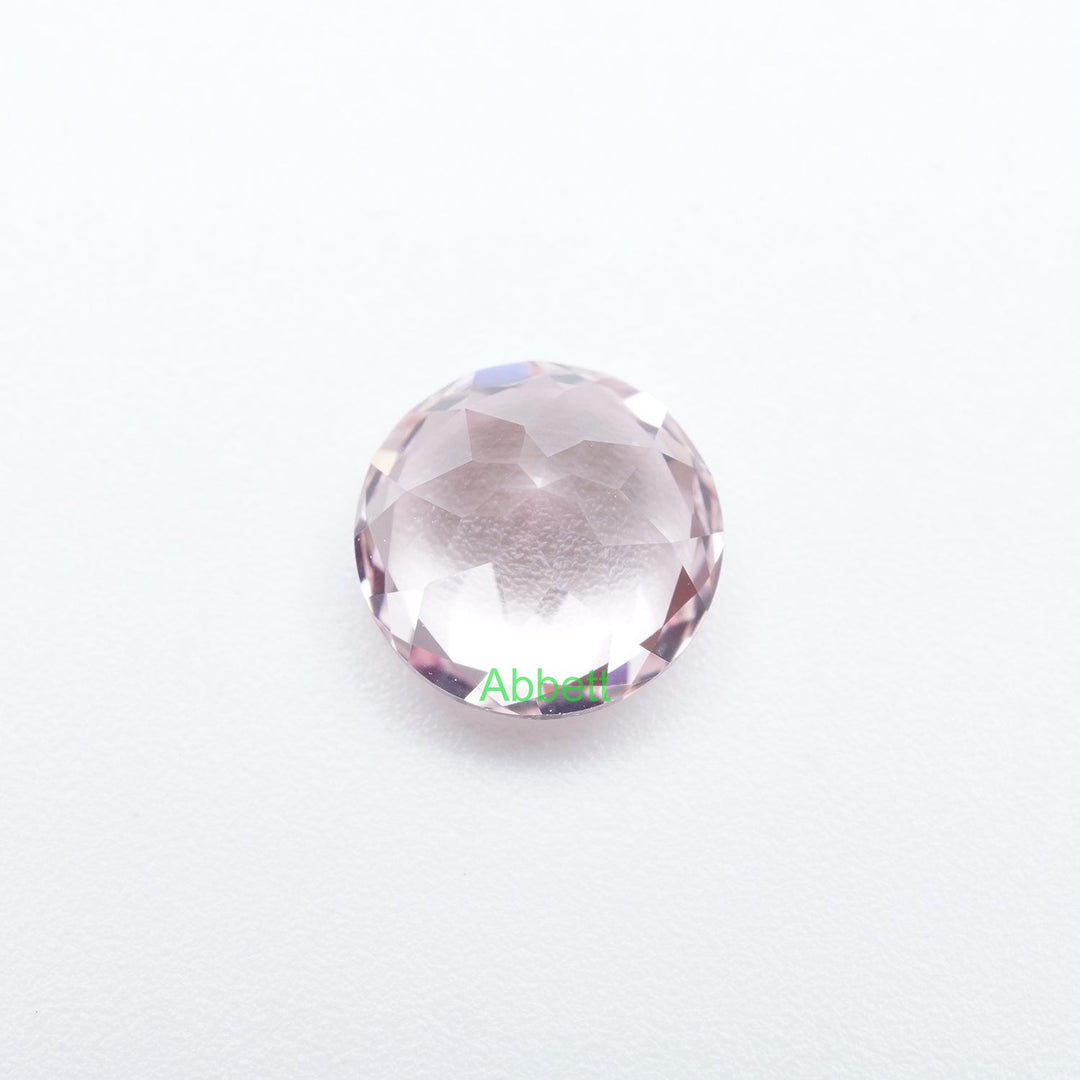 Round lab grown light pink sapphire