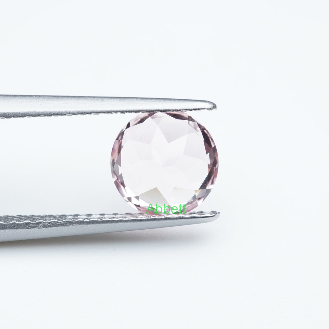 Round lab grown light pink sapphire