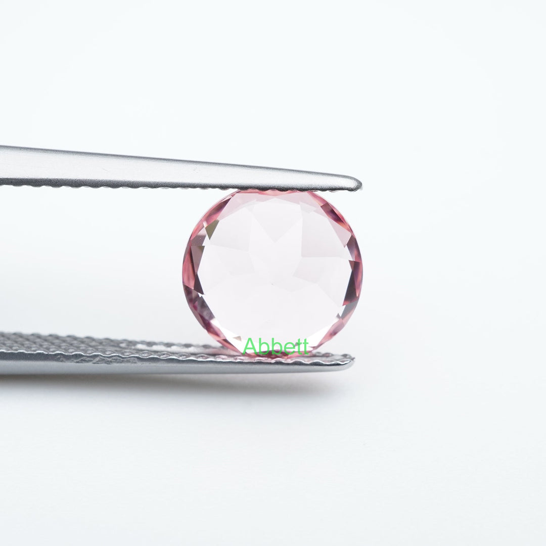 Round lab grown padparadscha sapphire