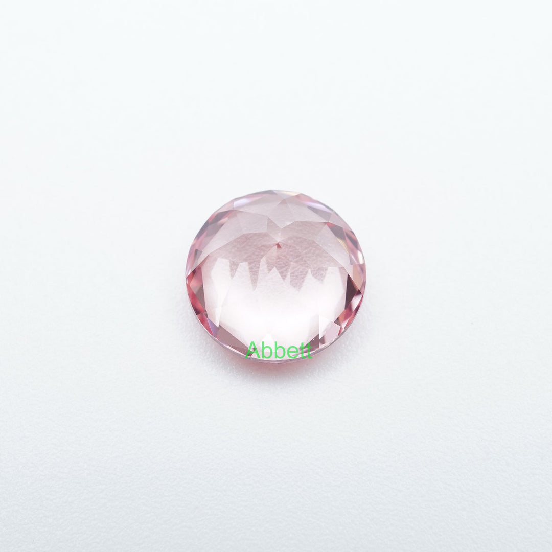 Round lab grown padparadscha sapphire
