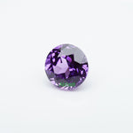 Load image into Gallery viewer, Round lab grown purple sapphire
