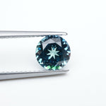 Load image into Gallery viewer, Round lab grown teal sapphire
