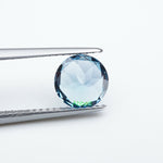 Load image into Gallery viewer, Round lab grown teal sapphire

