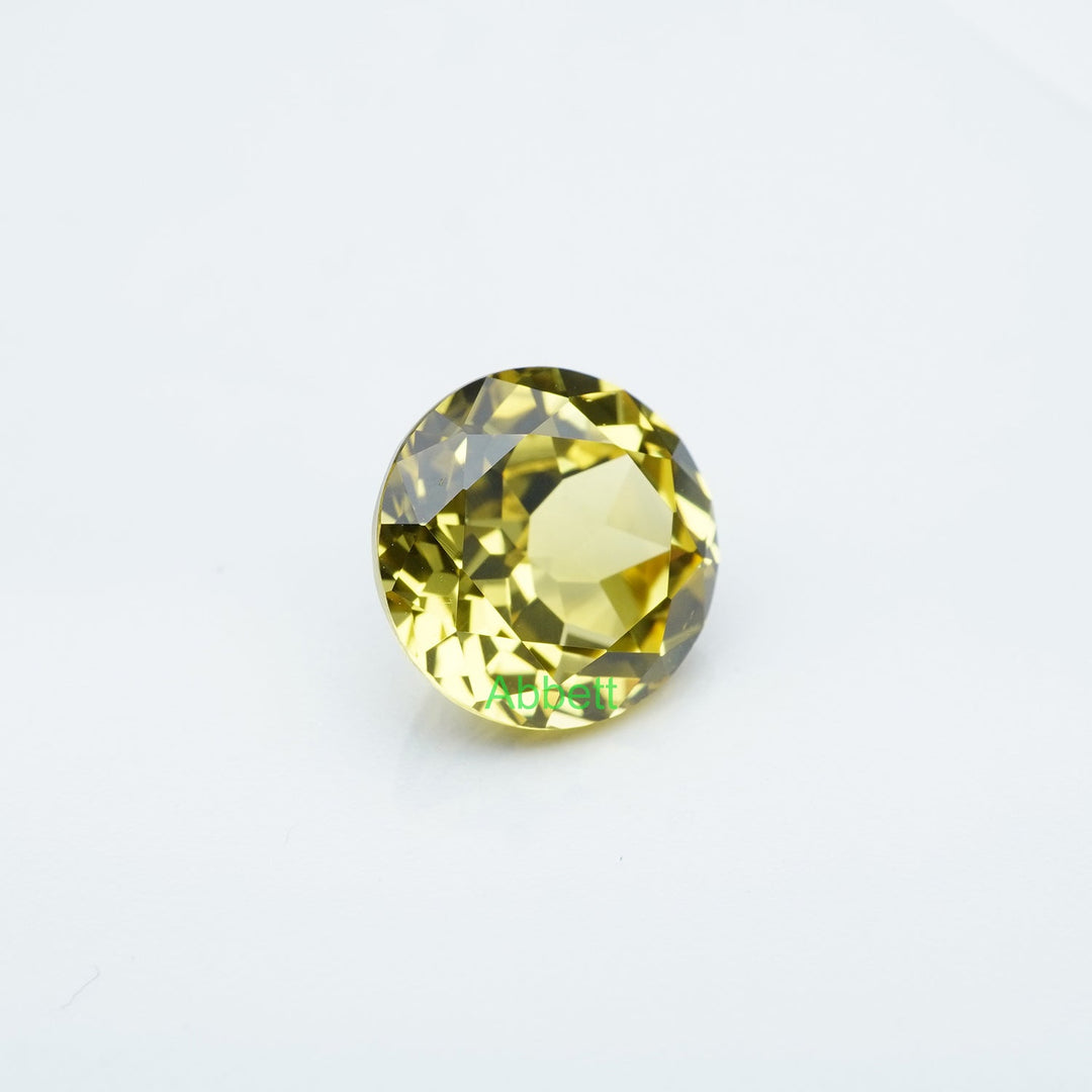 Round lab grown yellow sapphire