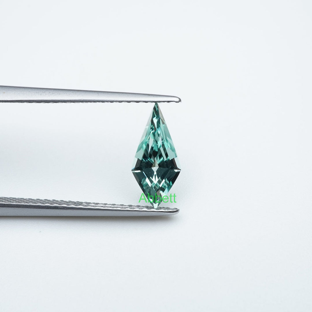 Shield lab grown green sapphire