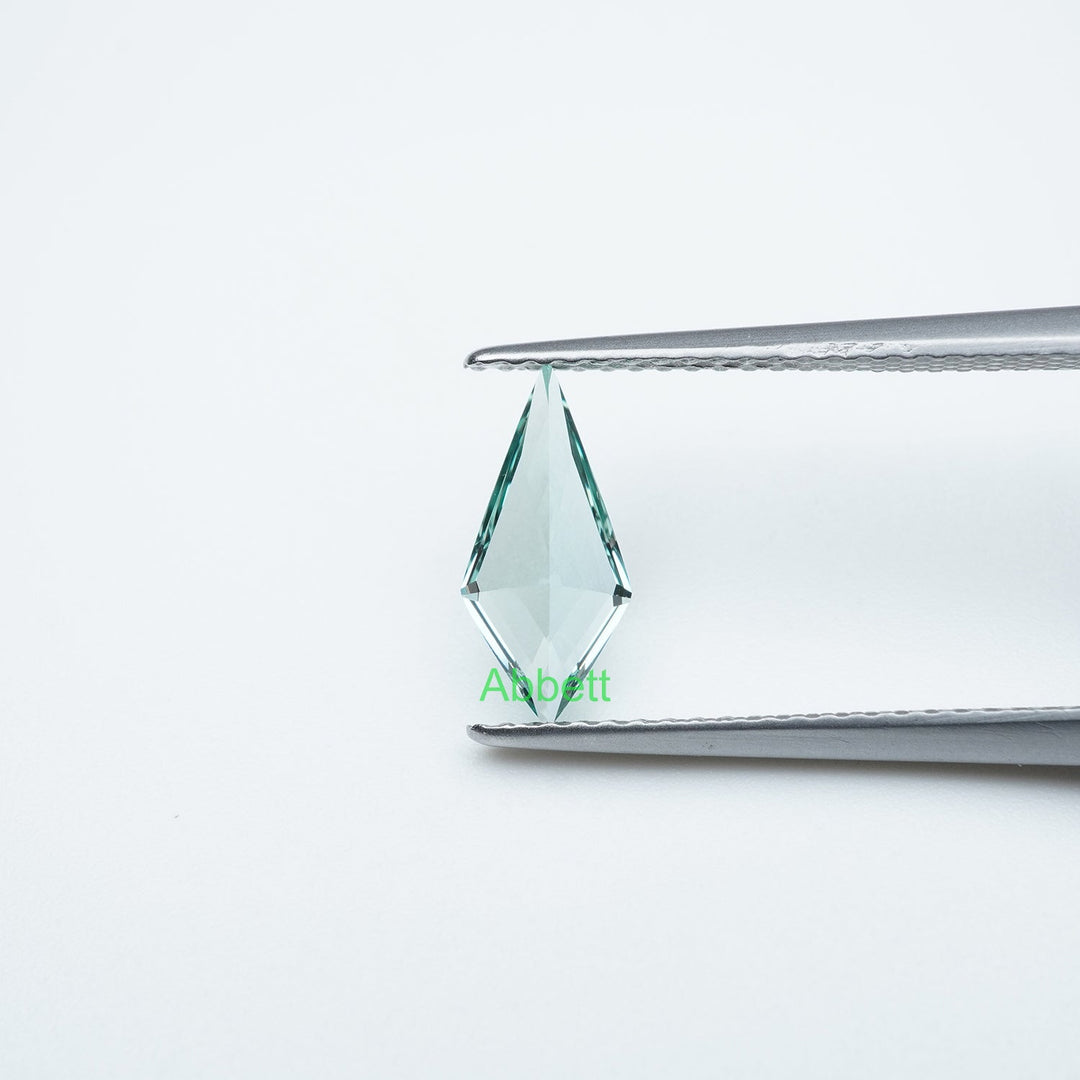 Shield lab grown green sapphire