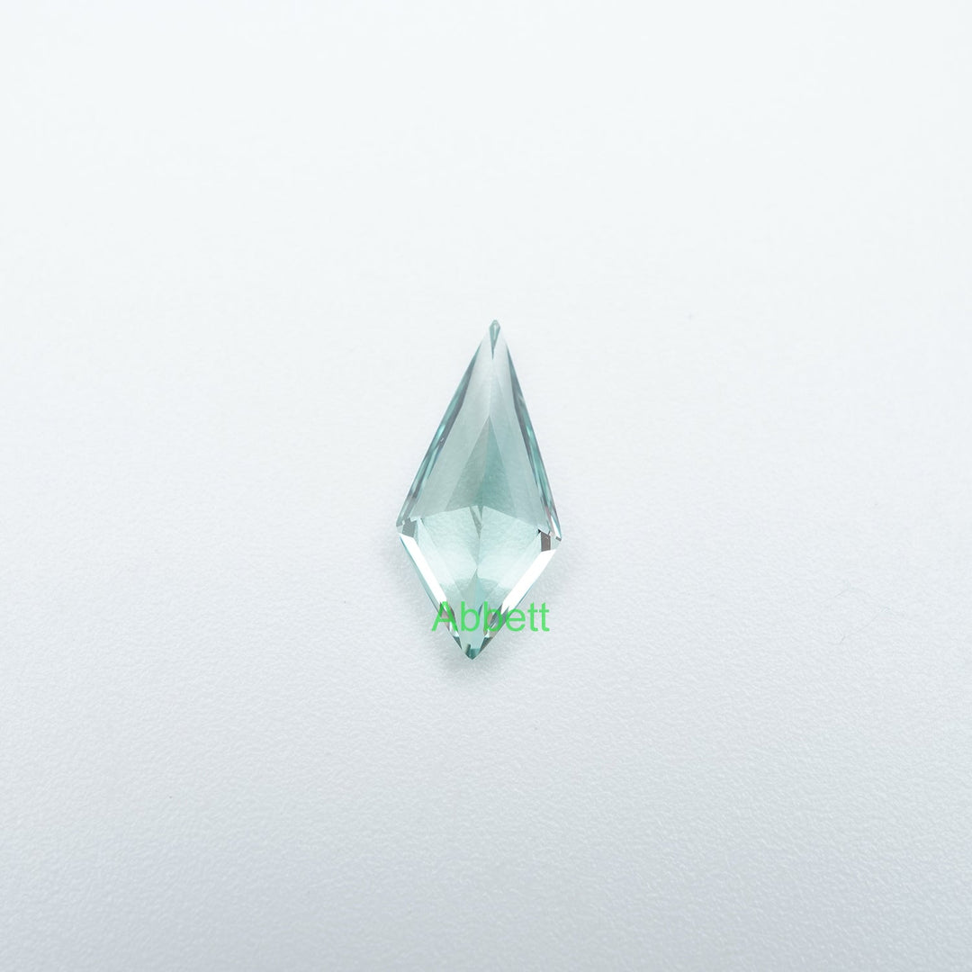 Shield lab grown green sapphire