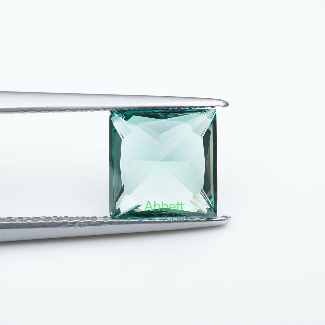 Square princess lab grown green sapphire