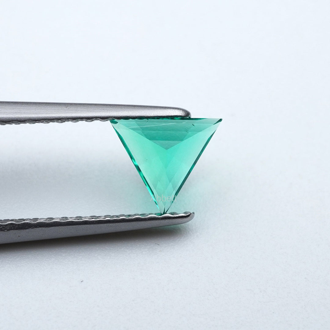 Triangle lab grown emerald