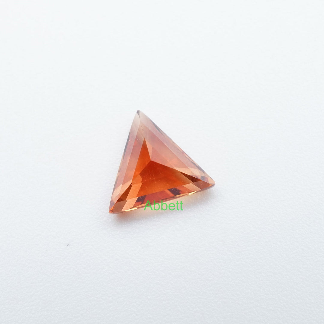 Triangle lab grown orange sapphire