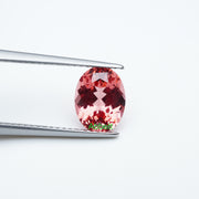 Oval lab grown padparadscha sapphire