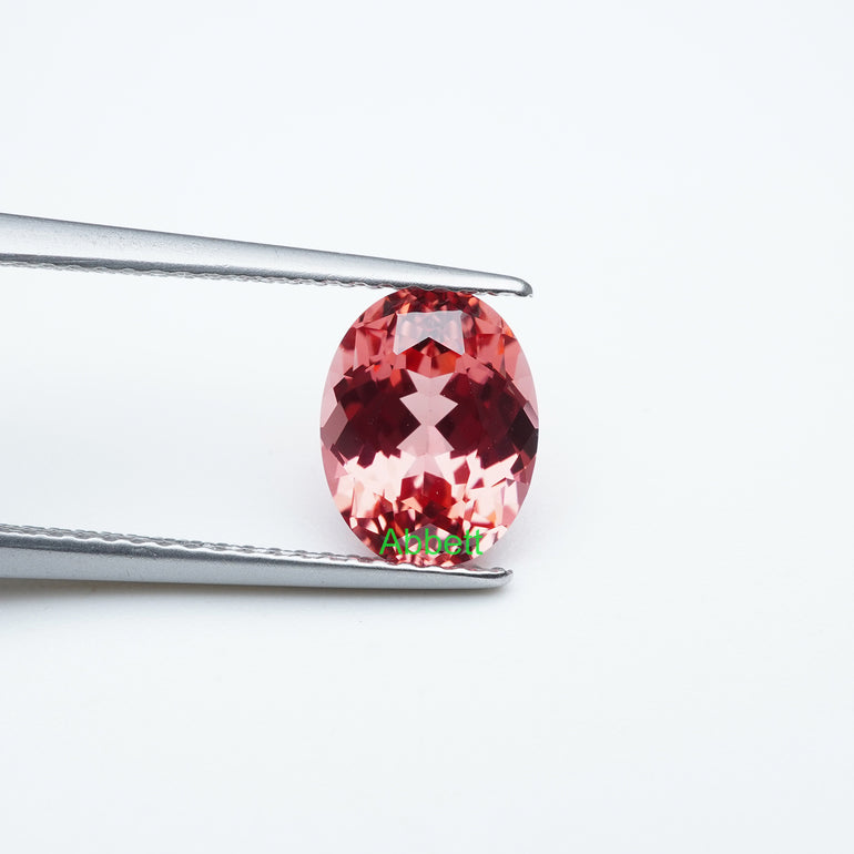 Oval lab grown padparadscha sapphire