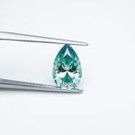 Load and play video in Gallery viewer, Pear teal moissanite

