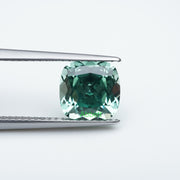 Cushion lab grown green sapphire