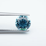 Load and play video in Gallery viewer, Round lab grown santa maria sapphire
