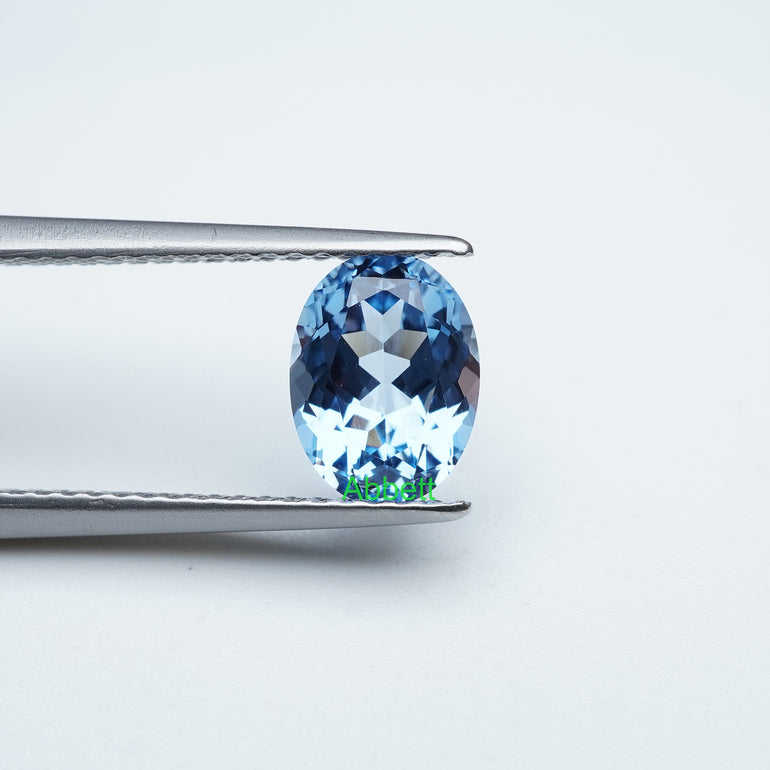 Oval lab grown aqua spinel