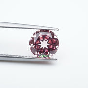 Round lab grown padparadscha sapphire