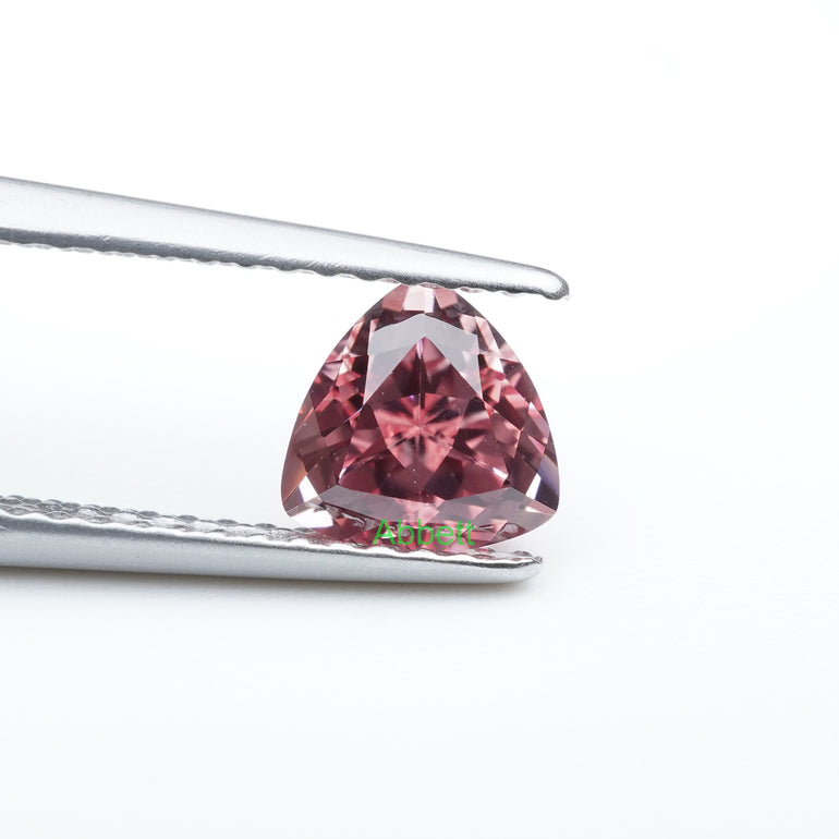 Trillion lab grown padparadscha sapphire