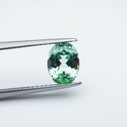 Oval lab grown green sapphire