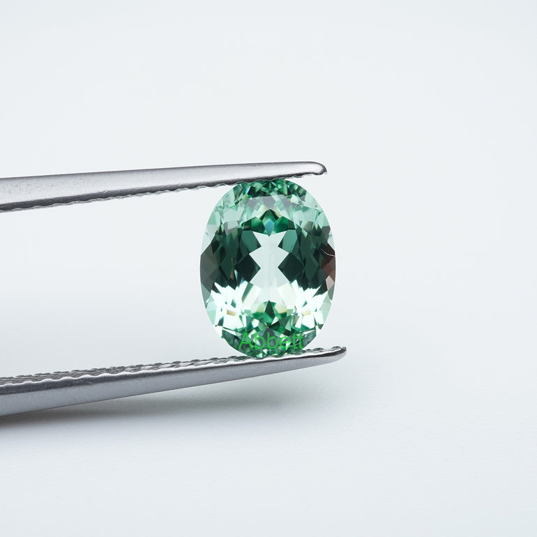 Oval lab grown green sapphire