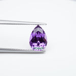 Load and play video in Gallery viewer, Pear lab grown purple sapphire
