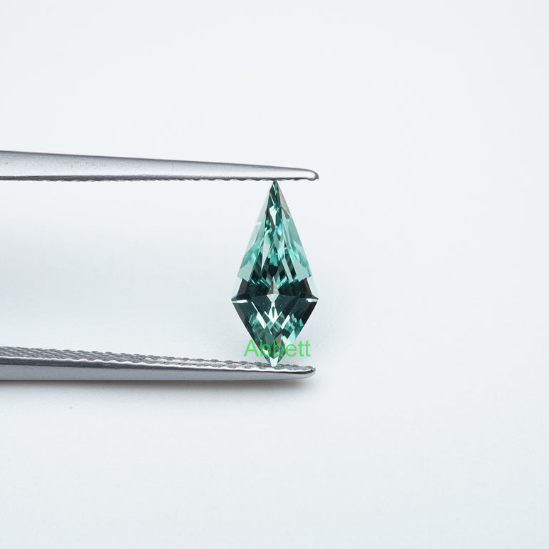 Shield lab grown green sapphire