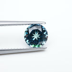 Load and play video in Gallery viewer, Round lab grown teal sapphire
