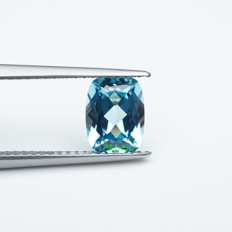 Antique cushion lab grown Santa Maria sapphire