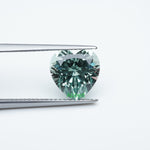 Load and play video in Gallery viewer, Heart lab grown green sapphire
