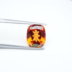 Load and play video in Gallery viewer, Antique cushion lab grown orange sapphire
