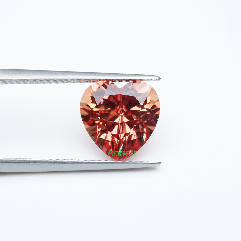 Heart lab grown orange sapphire