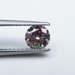 Load and play video in Gallery viewer, Round lab grown pink diamond
