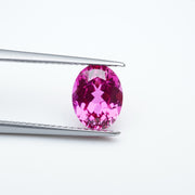 Oval lab grown hot pink sapphire