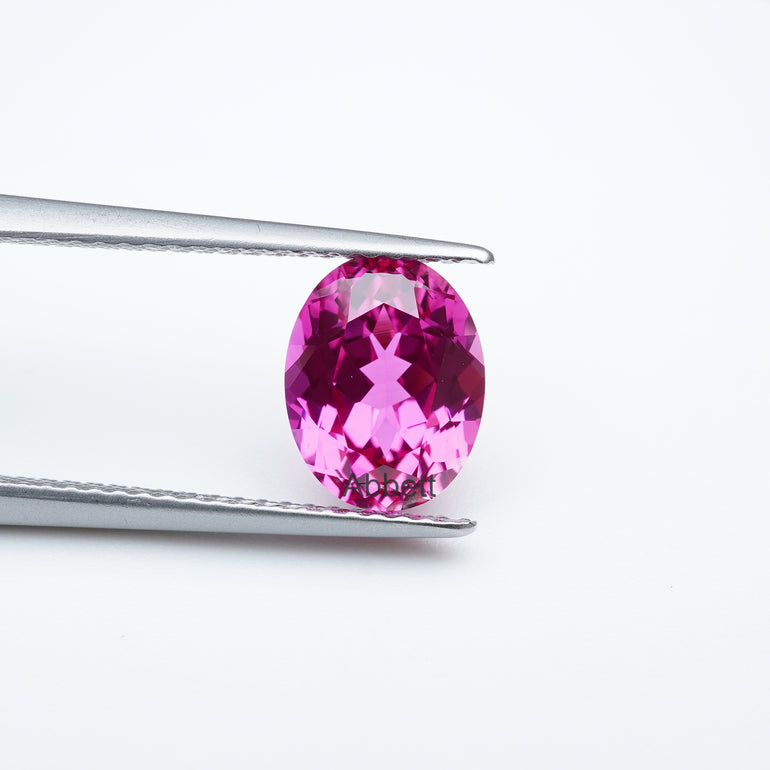 Oval lab grown hot pink sapphire