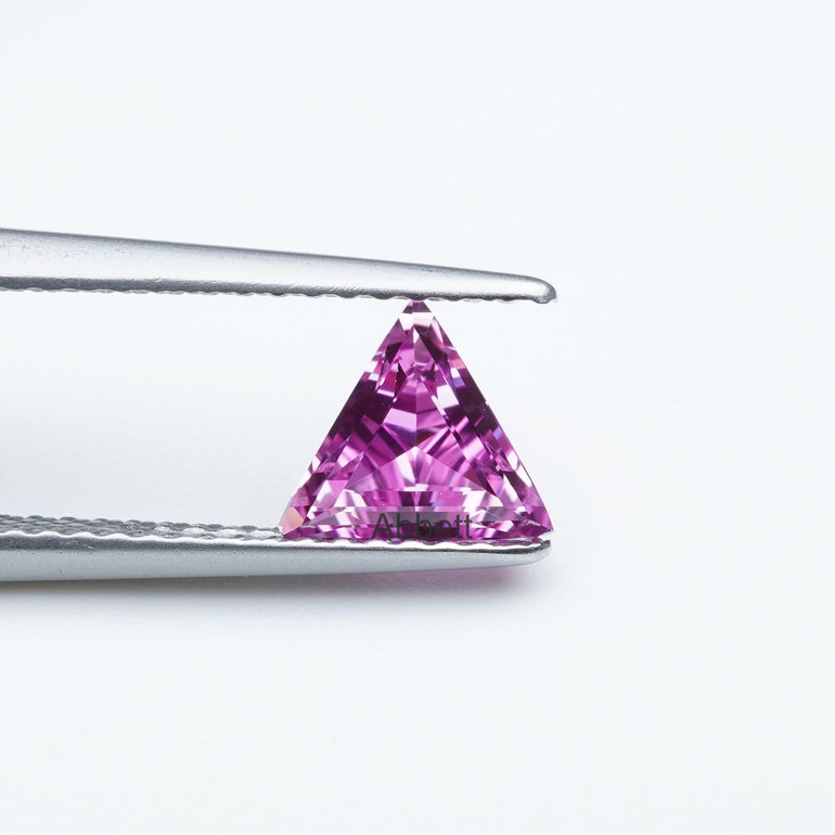 triangle lab grown hot pink sapphire