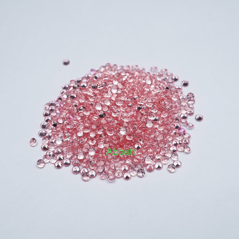 Round lab grown padparadscha sapphire melee