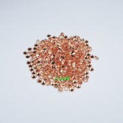 Round lab grown orange sapphire melee