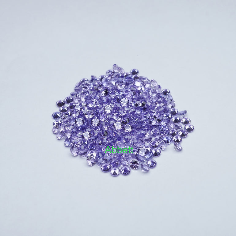 Round lab grown purple sapphire melee