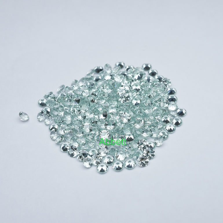 Round lab grown green sapphire melee