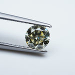 Load and play video in Gallery viewer, Round lab grown yellow diamond
